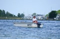 Bethany Beach, Delaware, U.S.A - September 2, 2019 - Angler on the boat fishing for flounder near Indian River Inlet in the summer