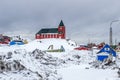 Bethel Church and Inuit village full of snow, Sisimiut & x28;Holsteinsborg& x29;, Greenland