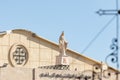 Stone statue of the Virgin Mary above the entrance to Eglise Syriaque Catholique Saint Joseph in Bethlehem in the Palestinian