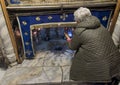 Bethlehem, Palestine - January 28, 2020: A silver star marks the traditional site of the birth of Jesus in Bethlehem`s Church of Royalty Free Stock Photo