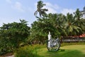 Bethsaida, Kerala, India, March, 09, 2019. Stylish bench and lamp in candles on territory of Ayurvedic resort Bethsaida Hermitage