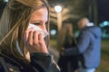 Betrayal. Upset crying girl discovering her boyfriend with another woman Royalty Free Stock Photo