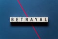 Betrayal word concept on cubes