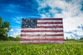 Betsy Ross American Flag in grass with clear blue sky Royalty Free Stock Photo