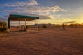 Puma gas station located on a dirt road in the Namib Desert at sunrise Royalty Free Stock Photo