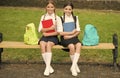 Better future together. School children sit on park bench. Happy children back to school. Childhood education. Formal Royalty Free Stock Photo