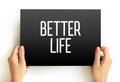 Better life text quote on card, concept background Royalty Free Stock Photo