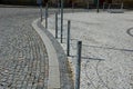 Better safety, the cities are equipped with posts on the edge of the sidewalk with chain railing. direct pedestrians to cross the