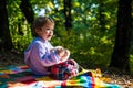 Better together. Happy childhood. Inseparable with toy. Boy cute child play with teddy bear toy forest background. Child Royalty Free Stock Photo