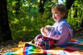 Better together. Happy childhood. Inseparable with toy. Boy cute child play with teddy bear toy forest background. Child Royalty Free Stock Photo