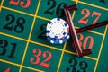 Betting casino chips on lucky number, roulette gambling