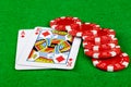 Betting chips and blackjack hand Royalty Free Stock Photo