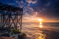 Beuatiful landscape scene with sun rays shot of a sunrise or sunset by the sea