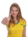 Beautiful woman from Brazil is ready for the footb
