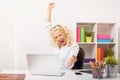 Beuatifull woman at the office celebrating her success Royalty Free Stock Photo