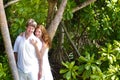 Beutiful couple in a tropical jungle Royalty Free Stock Photo