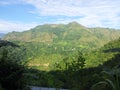 Green hills with blue sky