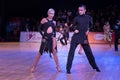 A Beutiful Photo of a Dancing Couple at a WDSF Ballroom Competition