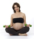 Beutiful Pregnant Woman with weights Royalty Free Stock Photo