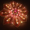 A beutiful rangoli of flowers and diyas in fastival days