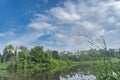 A beutiful scenery of landscape with river, sky in village in kerala, india Royalty Free Stock Photo