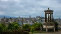 Beutiful shot of the Dugald Stewart Monument and the Edinburgh city skyline on a cloudy day Royalty Free Stock Photo