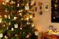 Christmassy Illuminated Interior with Christmas Tree - Bokeh Closeup Royalty Free Stock Photo