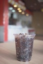 Beverage from cola in glass and a can of sparkling water with ice cube,beverage in summer is sparkling water Royalty Free Stock Photo