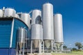 Beverage factory cylinders. With blue sky. Royalty Free Stock Photo