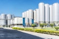 Beverage factory cylinders. With blue sky.