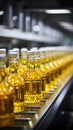 Beverage production line filling glass bottles with refreshing apple and pineapple juice Royalty Free Stock Photo