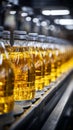 Beverage production line filling glass bottles with refreshing apple and pineapple juice Royalty Free Stock Photo