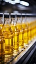 Beverage production line filling glass bottles with refreshing apple and pineapple juice Royalty Free Stock Photo