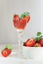 Beverage strawberry alcohol cocktail with mint and ice. Space for text Royalty Free Stock Photo