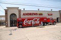 A beverage truck in front of a drug store Bellville, Michigan