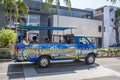 Tourists on tour bus/van in Rodeo Drive Royalty Free Stock Photo