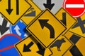 Beware curve ahead warning sign on blurry traffic symbol background Royalty Free Stock Photo