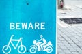 Beware Of Cyclists Road Safety blue Signage from bicycle and motorcycle on street