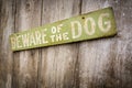 Beware Of Dog Sign on Old Worn Wood Fence Royalty Free Stock Photo