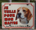 A Beware of Dog sign In rural Brittany warns that you enter at your risk and peril. Royalty Free Stock Photo