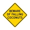 Beware of falling coconuts warning road sign Royalty Free Stock Photo