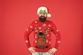 Beware. Holidays accessories. Hipster bearded man wear sweater and hat. Sweater with deer. Knitted sweater. Happy new Royalty Free Stock Photo
