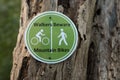 Beware of mountain bike riders on path sign Royalty Free Stock Photo