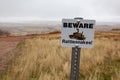 Beware Rattlesnakes Sign in South Dakota`s Badlands