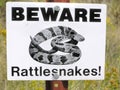 Beware of rattlesnakes signpost in the Badlands, South Dakota Royalty Free Stock Photo