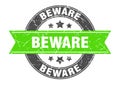beware round stamp with ribbon. label sign Royalty Free Stock Photo