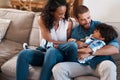 Beware the tickle monster. a young boy being tickled by his parents. Royalty Free Stock Photo