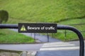 Beware of traffic sign on the road to prevent accidents Royalty Free Stock Photo