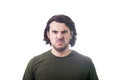 Bewildered and confused young man looking perplexed and upset to camera isolated on white background. Angry casual guy, long curly