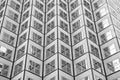 Bewitching pattern of windows. Skyscraper modern city architecture. Modern building architecture. Sky reflects in mirror